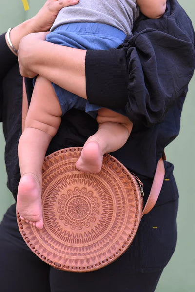 Embossed Circle Crossbody