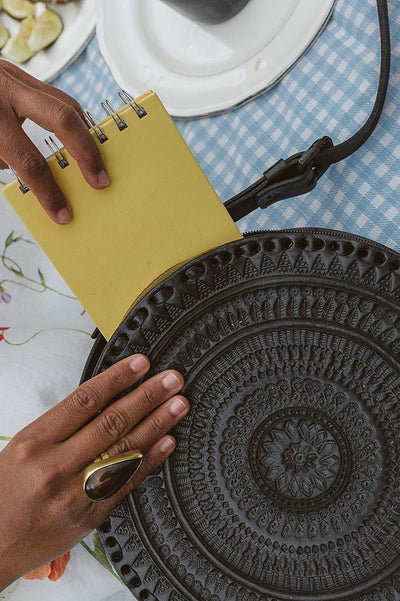 Embossed Circle Crossbody