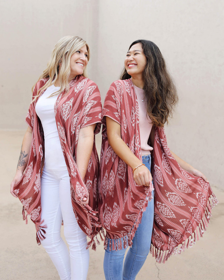 Natural plant dyes made from oranges, coffee, cacao, and hibiscus create the unique pink dye in Trades of Hope's Del Sol Kimono.