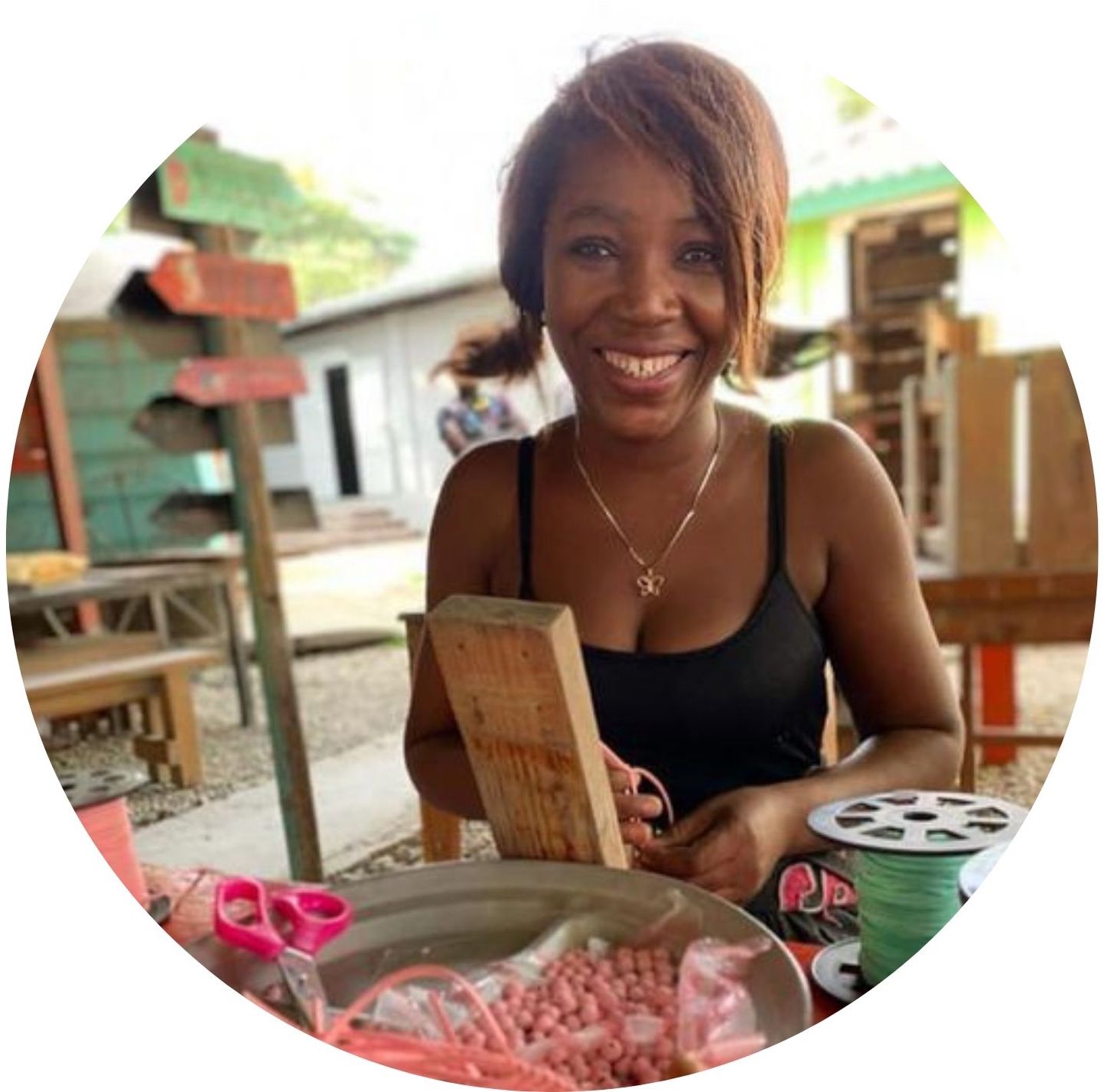 Clivia, Upcycled Cereal Box Bead Jewelry Artisan in Haiti
